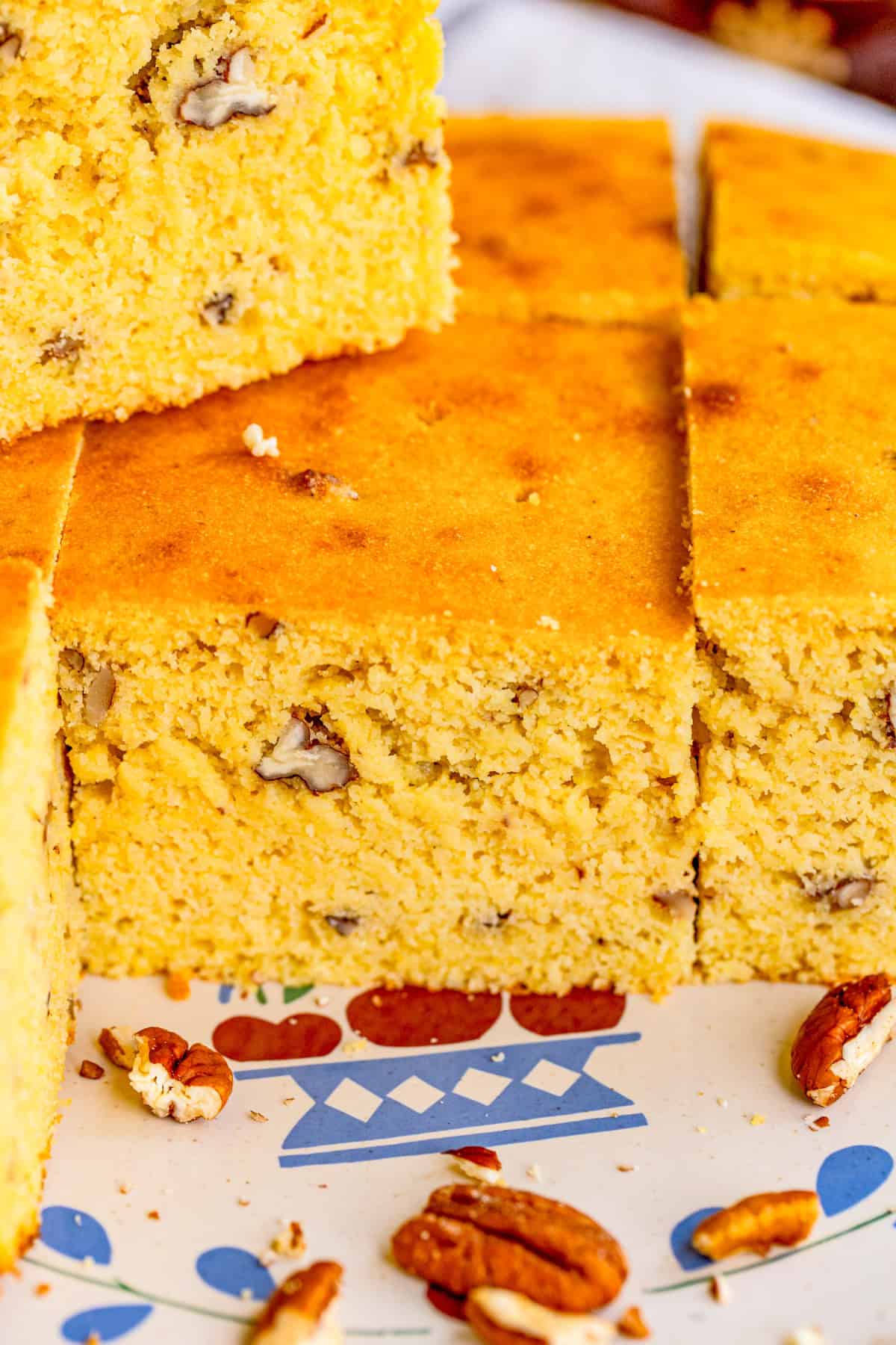 Finished cornbread on serving plate cut and stacked.