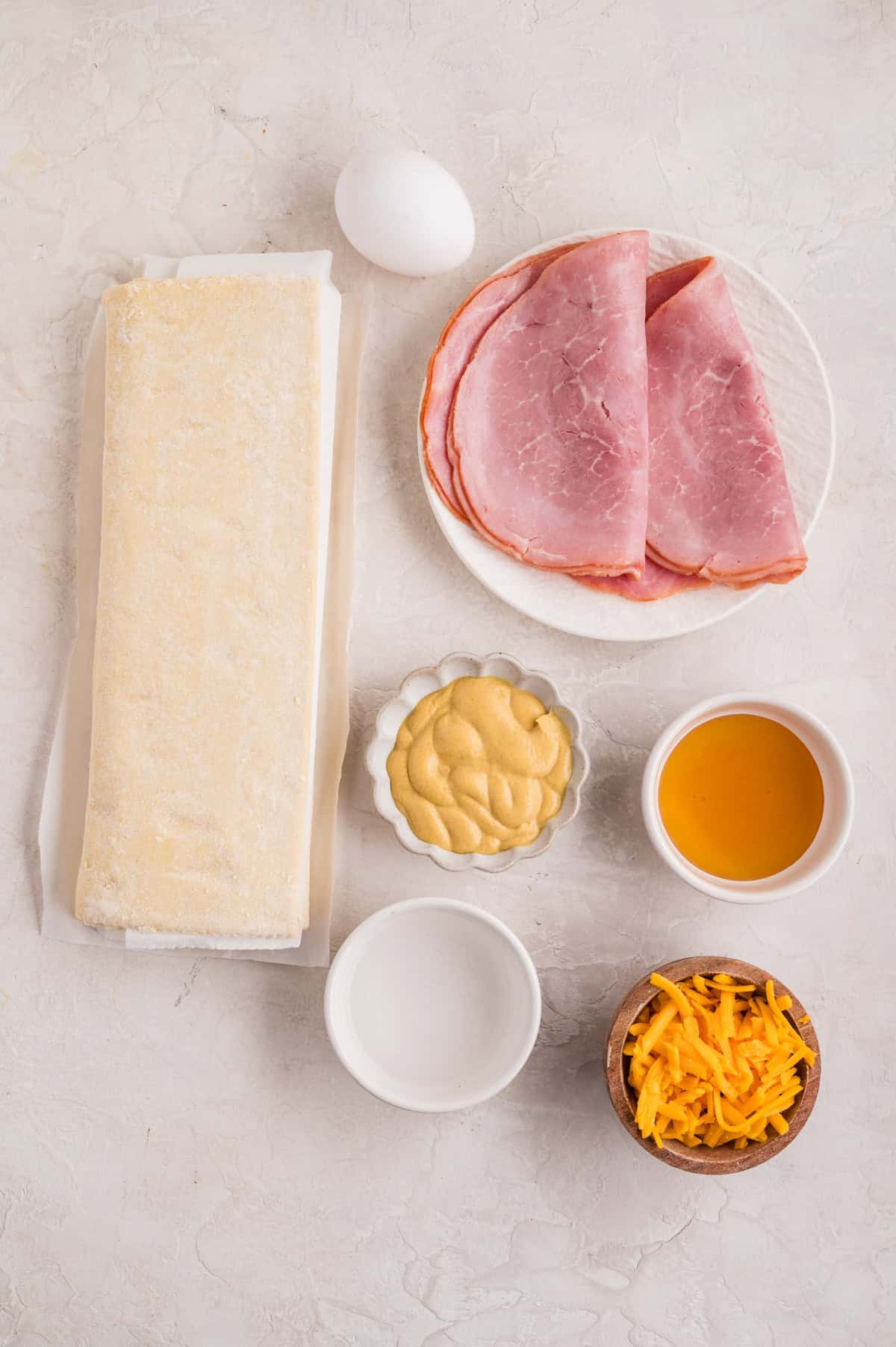 Ingredients needed to make Ham and Cheese Puff Pastry.