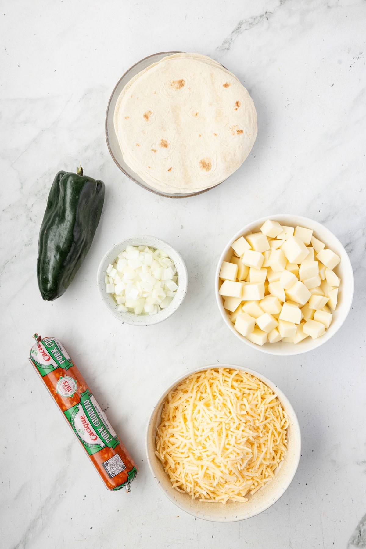 Ingredients needed to make a Queso Fundido Recipe.