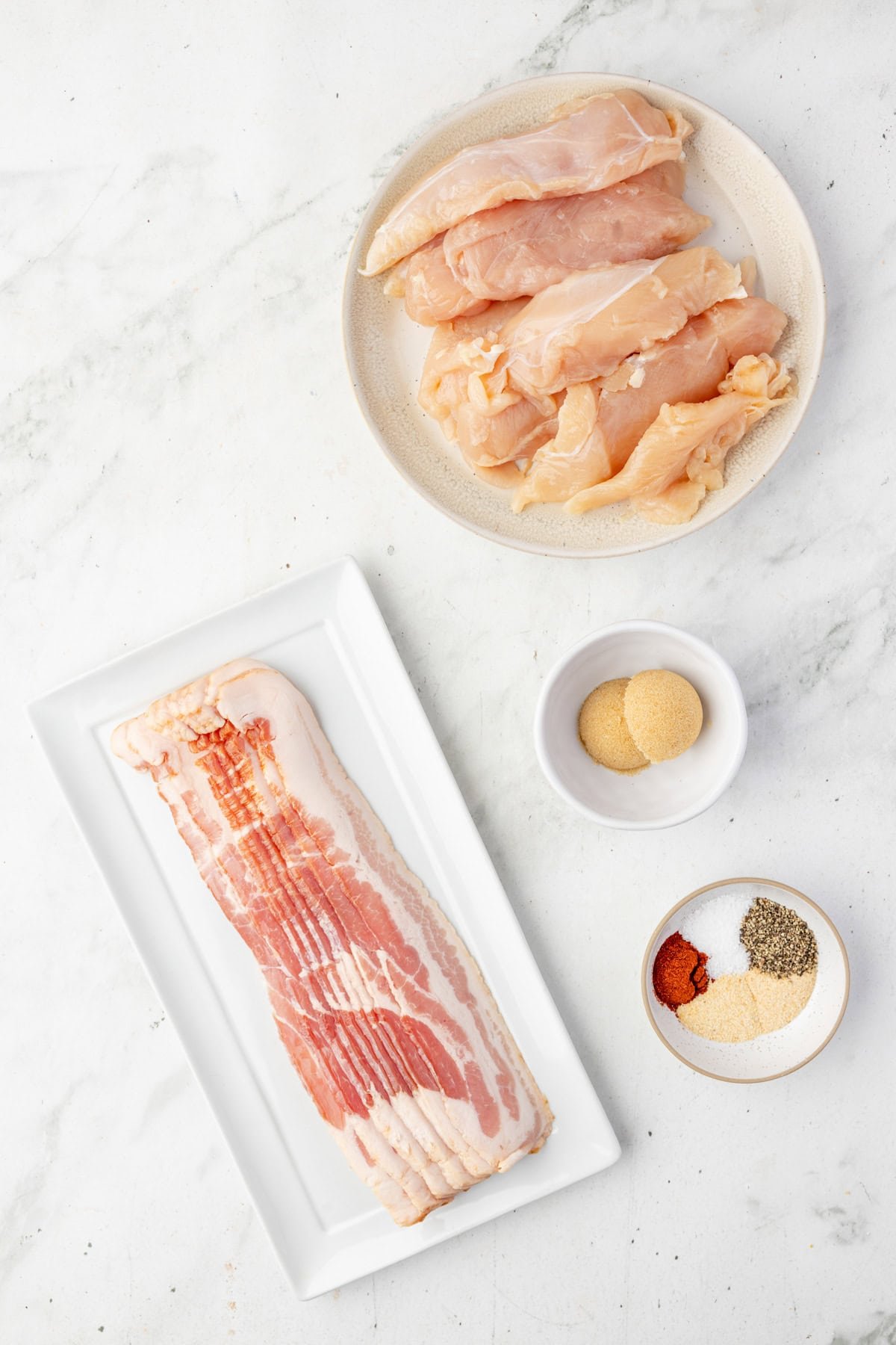 Ingredients needed to make Bacon Wrapped Chicken Tenders.